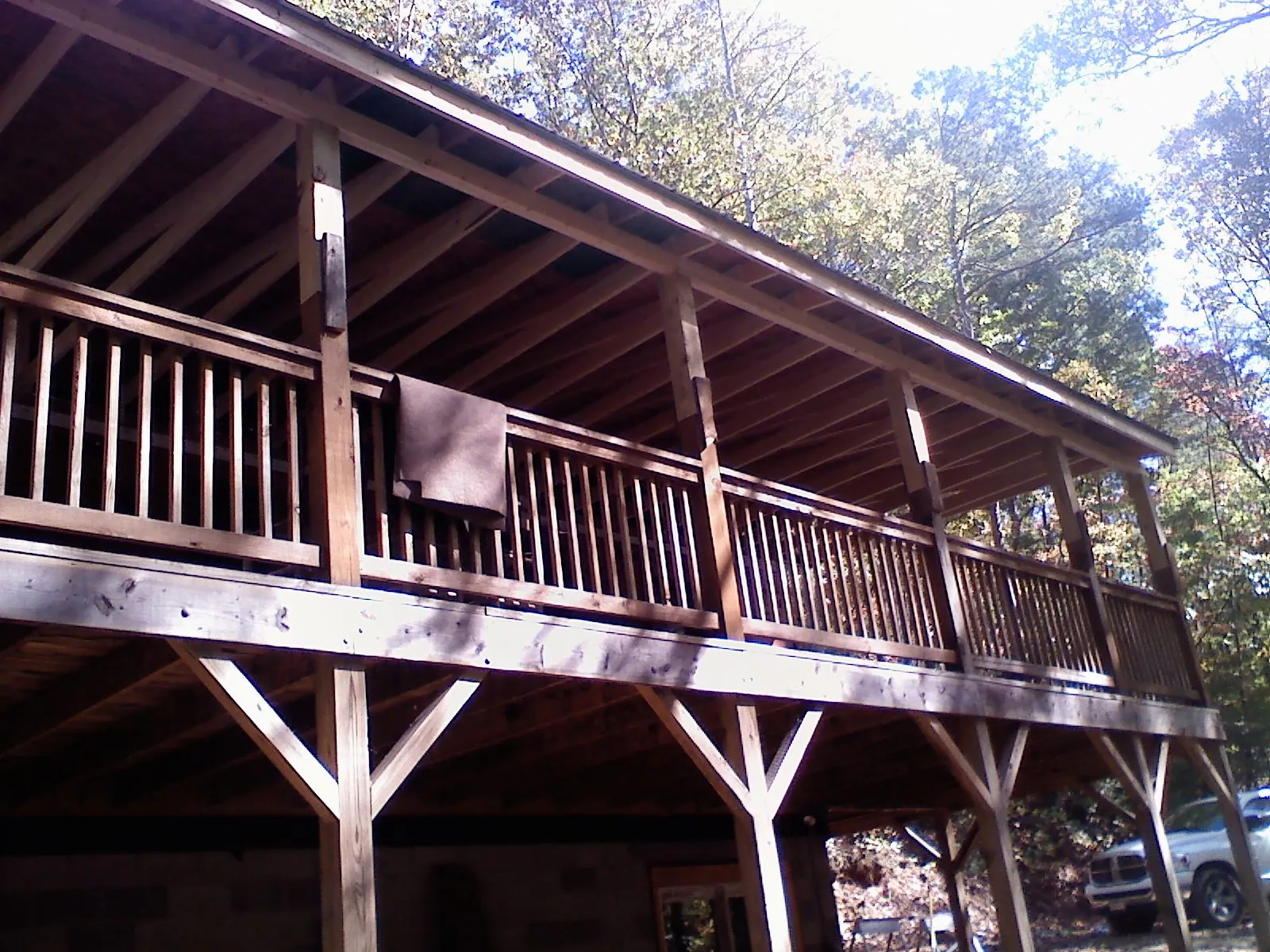 Timber framing under a new elevated porch and deck — Roof Leak Repair in Virgin by Roofing Brothers